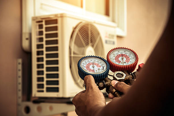 Professional Hvac technician working in Woburn, MA